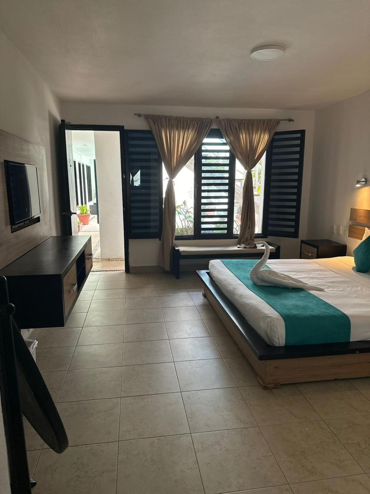 Casa Ticul Hotel Boutique - 5Th Ave (Adults Only) Playa del Carmen Exterior foto A room at the hotel