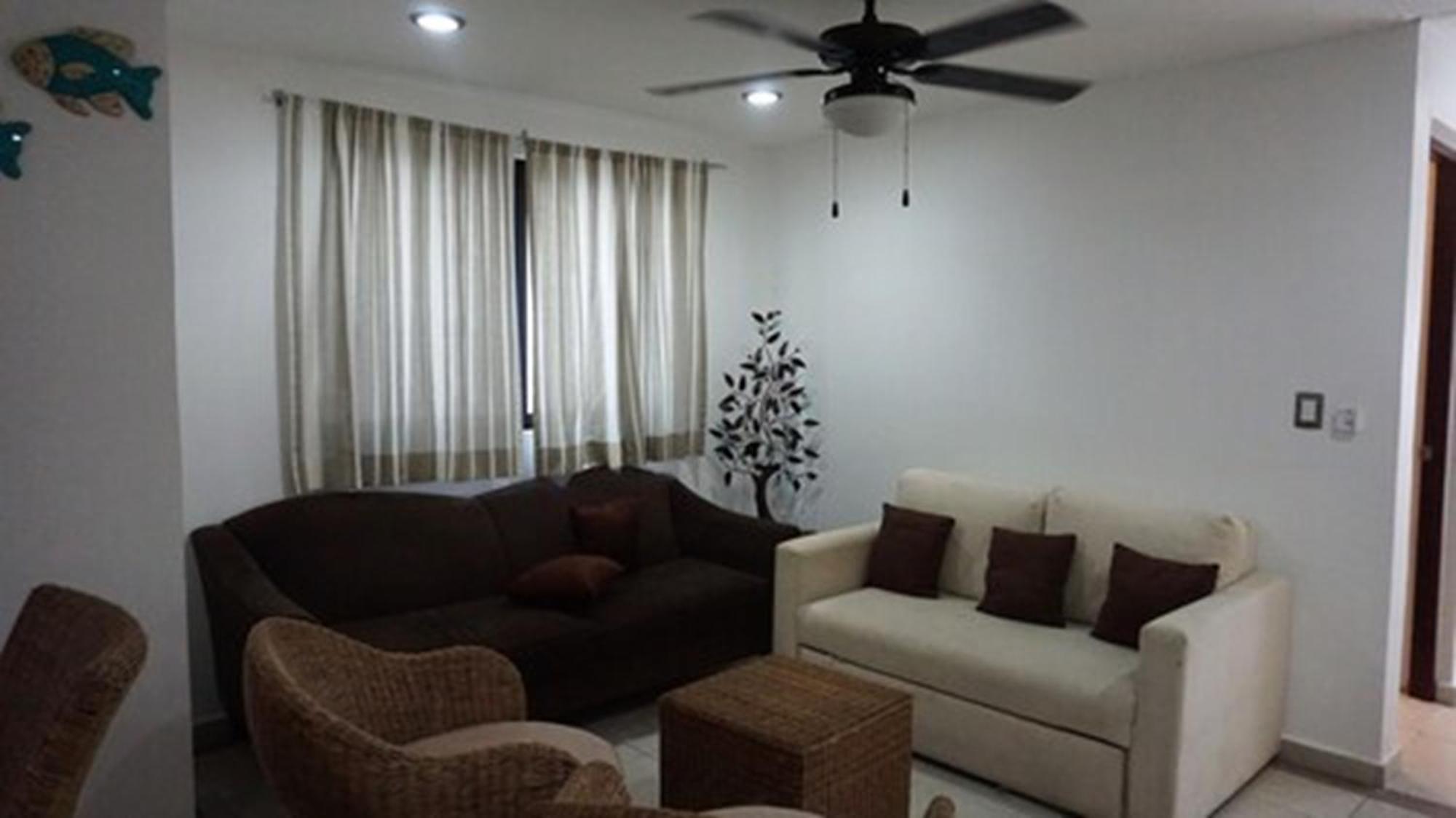 Casa Ticul Hotel Boutique - 5Th Ave (Adults Only) Playa del Carmen Exterior foto A living room with a ceiling fan